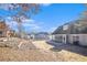 Spacious backyard with patio and screened porch at 232 Baywood Ln, Villa Rica, GA 30180