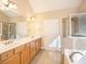 Bathroom with double vanity and separate shower and tub at 232 Baywood Ln, Villa Rica, GA 30180