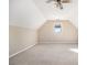 Large bedroom with sloped ceilings and ceiling fan at 232 Baywood Ln, Villa Rica, GA 30180