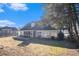 House exterior showcasing a large backyard and patio at 232 Baywood Ln, Villa Rica, GA 30180