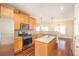 Island kitchen with hardwood floors and stainless steel appliances at 232 Baywood Ln, Villa Rica, GA 30180