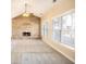 Bright living room with stone fireplace and lots of windows at 232 Baywood Ln, Villa Rica, GA 30180