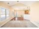 Open living room with hardwood floors and access to kitchen at 232 Baywood Ln, Villa Rica, GA 30180