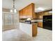 Kitchen with granite countertops and wooden cabinets at 40 Apache Ct, Locust Grove, GA 30248