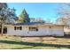 House exterior showcasing a deck and grassy backyard at 2756 Plantation Dr, East Point, GA 30344