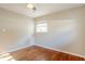 Bright bedroom with hardwood floors and ceiling fan at 2756 Plantation Dr, East Point, GA 30344