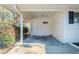 Covered patio area adjacent to the house with access to storage at 2756 Plantation Dr, East Point, GA 30344
