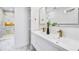 Bright bathroom with double sink vanity, modern fixtures, and a walk-in shower at 337 Pine Ne St # B, Atlanta, GA 30308