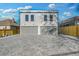 New construction home with a two-car garage and brick driveway at 337 Pine Ne St # B, Atlanta, GA 30308