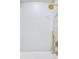 Sleek shower featuring gold fixtures, a rainfall showerhead and light grey tiling at 337 Pine Ne St # B, Atlanta, GA 30308