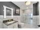 Modern bathroom with a walk-in shower and marble tile at 860 Peachtree Ne St # 2513, Atlanta, GA 30308