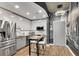 Modern kitchen with stainless steel appliances and city mural at 860 Peachtree Ne St # 2513, Atlanta, GA 30308