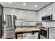 Modern kitchen with stainless steel appliances and granite countertop at 860 Peachtree Ne St # 2513, Atlanta, GA 30308