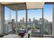 Spacious living room with floor-to-ceiling windows and a balcony at 860 Peachtree Ne St # 2513, Atlanta, GA 30308
