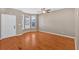 Hardwood floor living room with bay window and ceiling fan at 92 Timber Ridge Dr, Cartersville, GA 30121