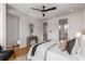 Main bedroom with hardwood floors and access to a private ensuite bathroom and walk-in closet at 105 Georgia Se Ave # 2, Atlanta, GA 30312