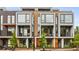 Modern townhomes with brick and gray siding, and private balconies at 105 Georgia Se Ave # 2, Atlanta, GA 30312