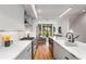 Modern kitchen with island, quartz countertops, and stainless steel appliances at 105 Georgia Se Ave # 2, Atlanta, GA 30312