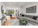 Open living area with sectional sofa and hardwood floors at 105 Georgia Se Ave # 2, Atlanta, GA 30312