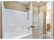 Bathroom with shower/tub combo and frosted glass door at 320 Harden Se St, Atlanta, GA 30312