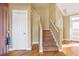 Entryway with stairs, hardwood floors, and coat closet at 320 Harden Se St, Atlanta, GA 30312