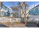 Two-story house with a white picket fence at 320 Harden Se St, Atlanta, GA 30312