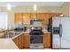 Updated kitchen with stainless steel appliances and ample counter space at 320 Harden Se St, Atlanta, GA 30312
