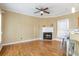 Spacious living room features hardwood floors, a fireplace, and a breakfast bar at 320 Harden Se St, Atlanta, GA 30312