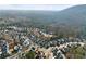 Aerial view of neighborhood near mountain at 449 Highlands Loop, Woodstock, GA 30188