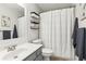 Clean bathroom with a shower/tub combo, vanity, and updated fixtures at 48 E Maxwell Nw Ave, Marietta, GA 30064