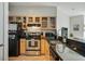 Modern kitchen with stainless steel appliances at 800 Peachtree Ne St # 8529, Atlanta, GA 30308