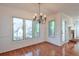 Bright dining room with hardwood floors and chandelier at 1499 Justin Dr, Lawrenceville, GA 30043