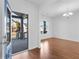 Entryway with blue door and view of the porch and dining room at 1501 Still Ridge Ln, Lawrenceville, GA 30045