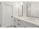 Double vanity bathroom with quartz countertops and mirrors at 1695 Thomas St, Decatur, GA 30032