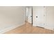 Spacious bedroom with hardwood floors and neutral walls at 1695 Thomas St, Decatur, GA 30032