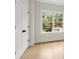 Bright bedroom with hardwood floors and large windows at 1695 Thomas St, Decatur, GA 30032