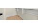 Spacious closet with built-in shelves and hanging rods at 1695 Thomas St, Decatur, GA 30032