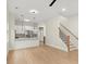Modern white kitchen with island and stainless steel appliances at 1695 Thomas St, Decatur, GA 30032
