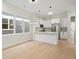Modern kitchen with white cabinets, stainless steel appliances, and quartz countertops at 1695 Thomas St, Decatur, GA 30032