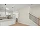 Open concept kitchen with island and stainless steel appliances at 1695 Thomas St, Decatur, GA 30032