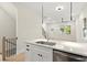 Open concept kitchen with island and stainless steel appliances at 1695 Thomas St, Decatur, GA 30032