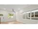 Light-filled living room with hardwood floors and large windows at 1695 Thomas St, Decatur, GA 30032