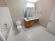 Clean bathroom with a shower/tub combo, toilet and vanity at 501 Country Park Se Dr, Smyrna, GA 30080