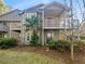 Two-story townhome with private balcony and landscaped yard at 501 Country Park Se Dr, Smyrna, GA 30080