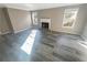 Spacious living room with hardwood floors and fireplace at 501 Country Park Se Dr, Smyrna, GA 30080