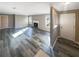 Living room featuring a fireplace and wood-look vinyl flooring at 501 Country Park Se Dr, Smyrna, GA 30080