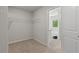 Large walk-in closet with wire shelving and carpeting at 10 Camellia Dr, Fairburn, GA 30213