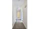 Clean hallway with carpeted floors and access to bedrooms at 114 Blake Cv, Douglasville, GA 30134