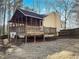 House back view with deck and screened porch at 114 Blake Cv, Douglasville, GA 30134