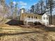 House front view with porch and landscaping at 114 Blake Cv, Douglasville, GA 30134